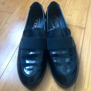 Tod’s black patent loafers